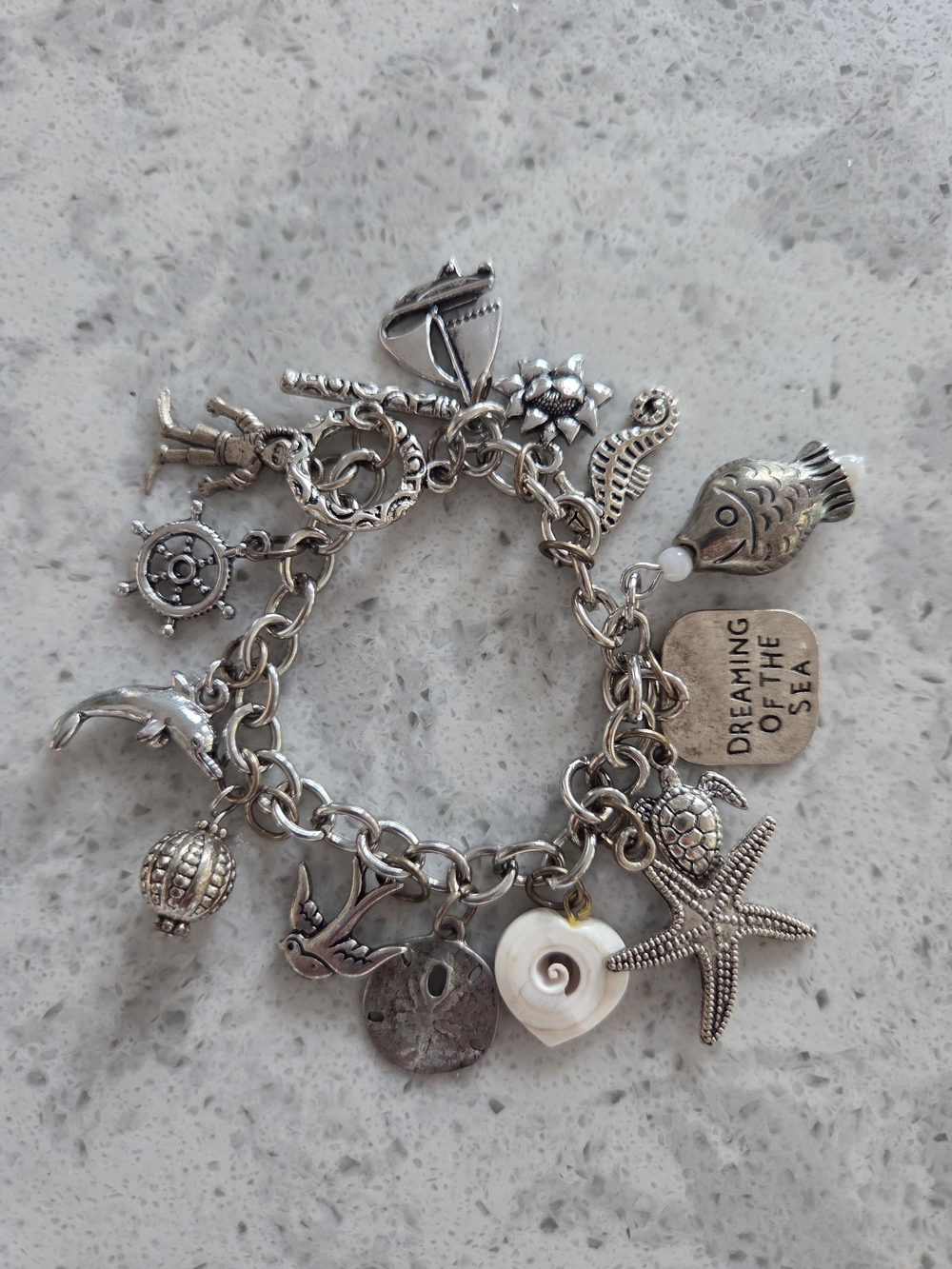 'Dreaming Of The Sea' Silver Tone Charm Bracelet with Nautical Charms
